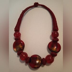 #429.   Red Acrylic And Glass Beaded Statement Necklace.